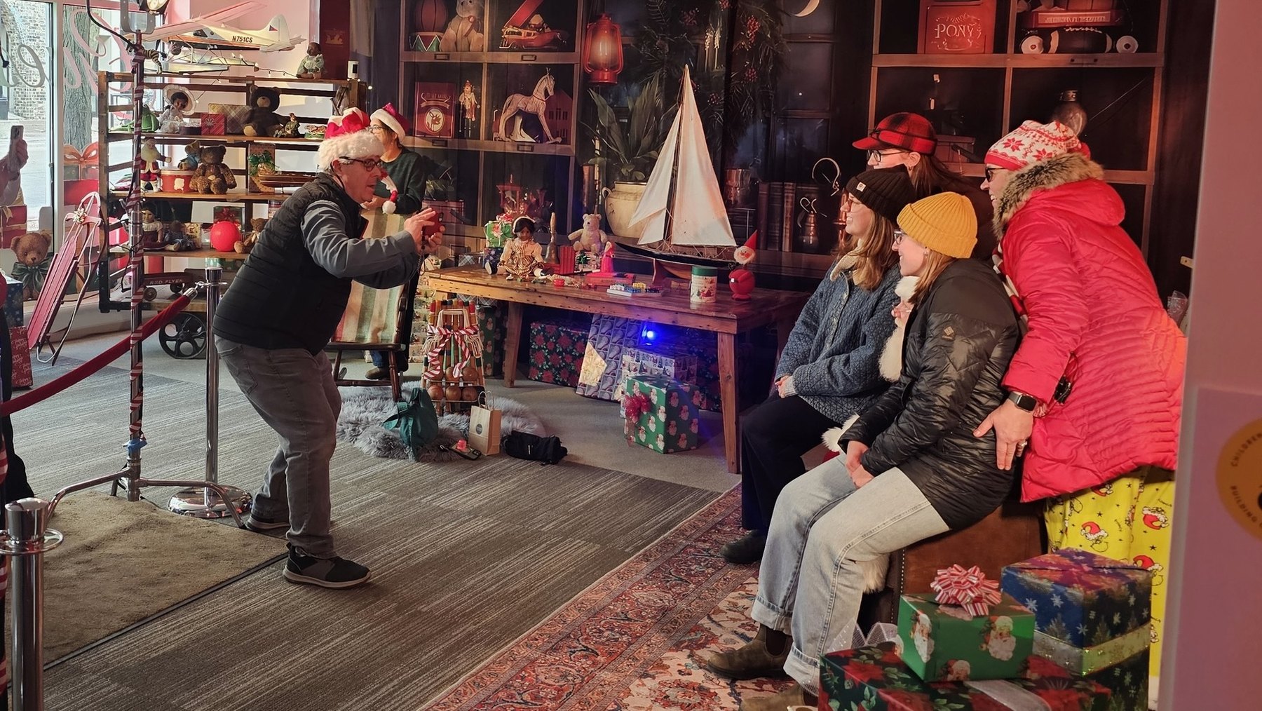 Visitors gathered in Santa’s decorated workshop