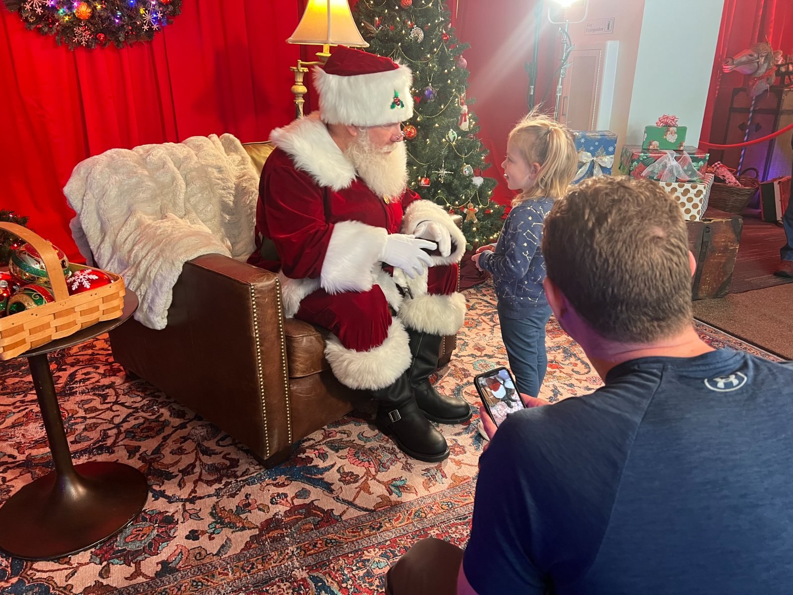 Santa talking with a child